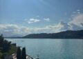 blue lake in austria with blue skies