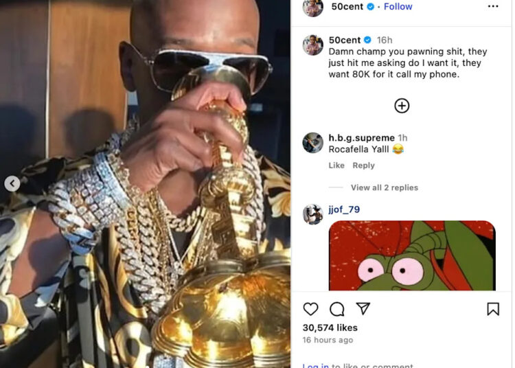 A person wearing sunglasses and heavy jewelry drinks from a gold chalice. The Instagram post is by 50 Cent.