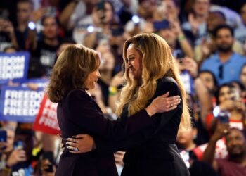 Beyoncé, right, and Vice President Kamala Harris embrace at a rally in Houston on October 25, 2024.