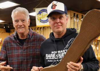 Norman Harris (left) and Joe Bonamassa inside the former's legendary guitar store