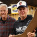 Norman Harris (left) and Joe Bonamassa inside the former's legendary guitar store