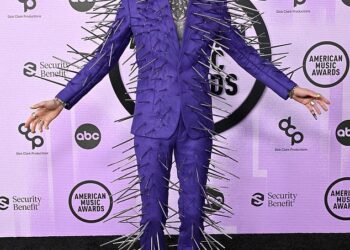 Over the years, some stars have attended the American Music Awards in fashion fails, and DailyMail.com rounded up the worst looks. Machine Gun Kelly is seen in 2022
