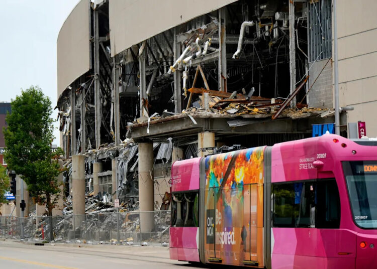 Demolition continues July 2 on the Myriad Convention Center, which is being torn down so the site can be used for the new arena for the Oklahoma City Thunder.