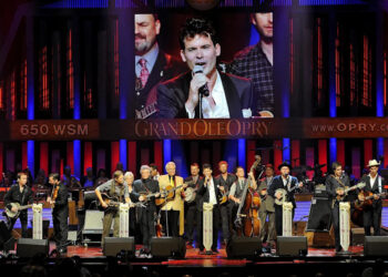 After the Old Crow Medicine Show became the newest members of the Grand Ole Opry, they and other members of the Opry perform "Will The Circle Be Unbroken" at the Opry House on Sept. 17, 2013.