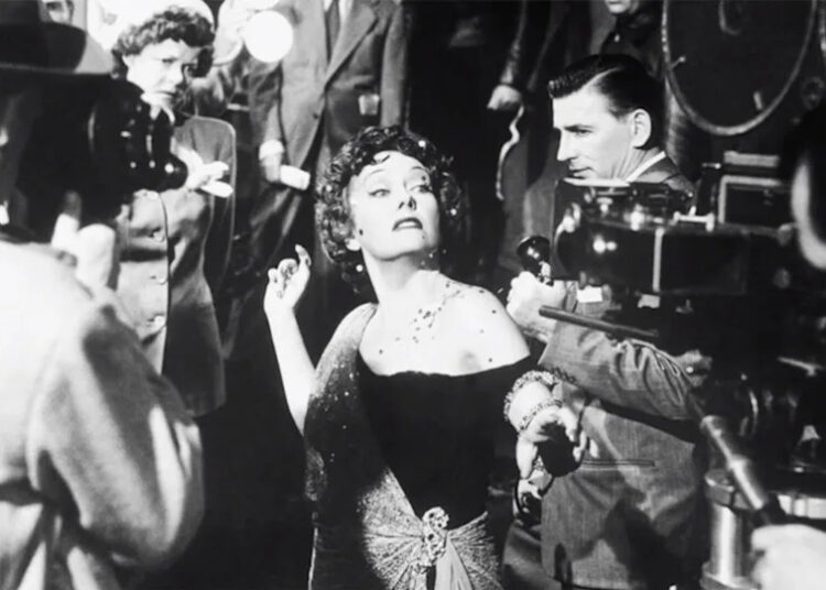 Gloria Swanson, as Norma Desmond, filming Billy Wilder's