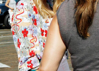 Miley Cyrus as Hannah Montana.