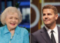 Betty White smiles wearing blue coat, David Boreanaz sports black suit.