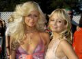 Paris Hilton (left) and Nicole Richie at the height of their “It Girl” fame. Drenching ourselves in their glamour helped us avoid thinking about real-world problems.
