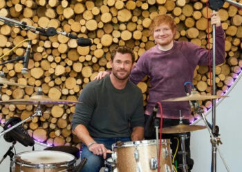 When Ed Sheeran invites Chris Hemsworth to perform at a stadium concert, Chris has just months to master drumming - Credit: National Geographic/Laura Radford
