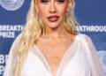 Christina Aguilera wearing Dolce and Gabbana with David Yurman earrings arrives at the 11th Annual Breakthrough Prize Ceremony 2025