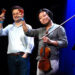 Violist John Stulz, left, and violinist Siwoo Kim, founders of the VIVO Music Festival, raise a toast during the 2024 "Beer and Beethoven" performance at Natalie's Grandview. This year, the annual chamber music festival will run Aug. 27-31 at various Columbus venues.