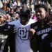 Nov 29, 2024; Boulder, Colorado, USA; Colorado Buffaloes safety Shilo Sanders (21) and head coach Deion Sanders and quarterba