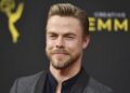 Derek Hough is the new 'Extra' host, replacing Billy Bush