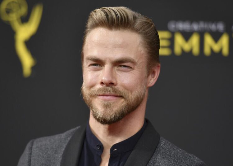 Derek Hough is the new 'Extra' host, replacing Billy Bush