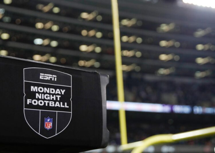 Disney's ESPN announces major deals with NFL, WWE, as entertainment company's profits soar