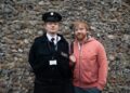 Image may contain Rupert Grint Ed Sheeran Clothing Coat Jacket Architecture Building Wall Adult Person and Hat