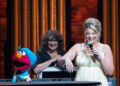Sesame Street’s Elmo, performs with Lauren Alaina at Grand Ole Opry in Nashville, Tenn., Thursday, Aug. 14, 2025.
