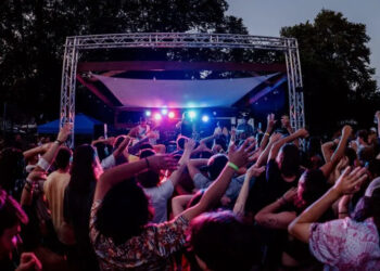Attendees at "Small Foreign Farewell," a concert featuring Small Foreign Faction and other West Michigan bands at Sullivan Field (formerly Valley Field) from 2023. (Courtesy Lili Bulkowski)