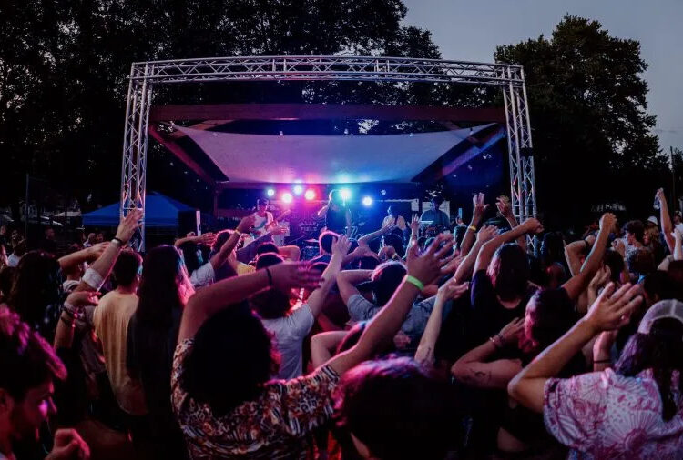 Attendees at "Small Foreign Farewell," a concert featuring Small Foreign Faction and other West Michigan bands at Sullivan Field (formerly Valley Field) from 2023. (Courtesy Lili Bulkowski)