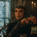 The Evil Queen (Gal Gadot) has dinner in Snow White.
