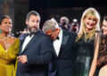 Nicole Avant, Adam Sandler, George Clooney, Laura Dern and Riley Keough posing for photographers on the Venice Film Festival red carpet