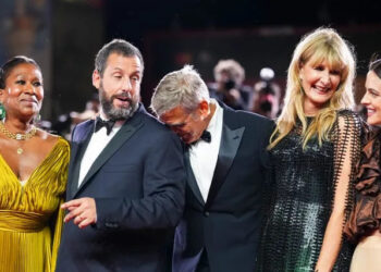 Nicole Avant, Adam Sandler, George Clooney, Laura Dern and Riley Keough posing for photographers on the Venice Film Festival red carpet