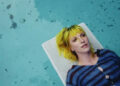 Hayley Williams in 'Glum' video. - Credit: youtube/Hayley Williams