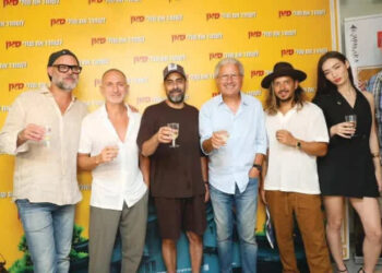 FROM LEFT, Ben Bachar, the film’s director, with actors Shalom Michaelshwilli and Avi Israelof, producer Moshe Edery, and actors Tzion Baruch and Emma Medding, as they toast ‘Saving Shuli-San’s millionth ticket sale. (photo credit: RAFI DELOYA)