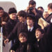(L-R) George Harrison, Ringo Starr, John Lenon, and Paul Mccartney arriving at JFK airport in 'Beatles 64.'
