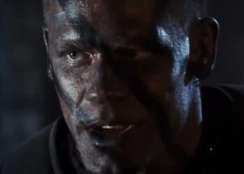 John Cena with war paint on his face in The Marine.