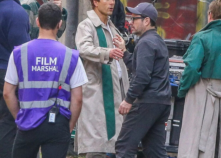 Actor Glen Powell, center, and director J.J. Abrams film on Glasgow's Newton Street in June for the Warner Bros. production of "Ghostwriter."