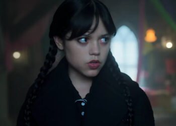 Jenna Ortega looking to the side in Wednesday Season 2.