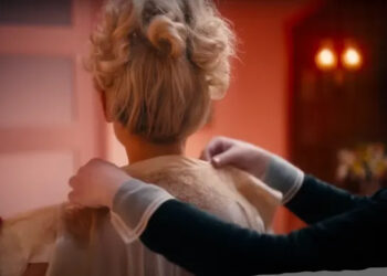 YouTube/Jennifer Lopez A close-up of Jennifer Lopez's curly blonde updo