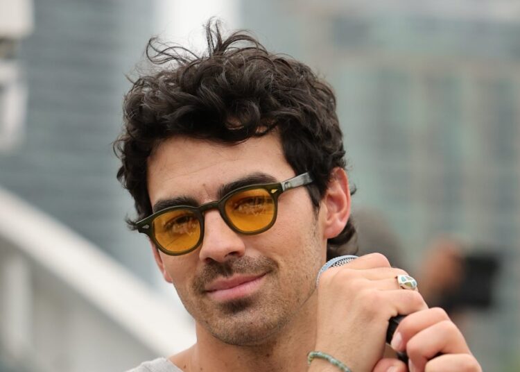 Joe Jonas Recalls 'Embarrassing' Himself After Joining Mile High Club