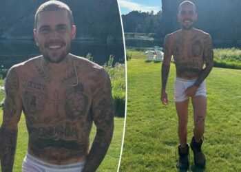 Justin Bieber has his hands full in nothing but tighty-whities and combat boots