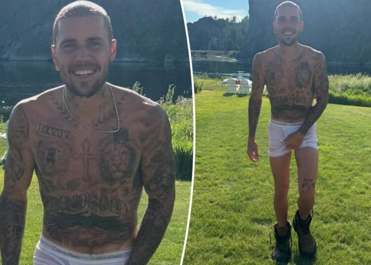 Justin Bieber has his hands full in nothing but tighty-whities and combat boots