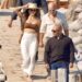*exclusive* ibiza, spain amazon billionaire jeff bezos and his newlywed wife lauren sanchez were spotted leaving a restaurant in ibiza before heading to their mega luxury yacht. just a day after bravely teetering over rocky terrain in sky high stilettos, lauren kicked off her shoes and went barefoot on the beach today. the couple were joined by friends, including the hollywood star leonardo dicaprio and girlfriend vittoria ceretti along with the former vogue editor in chief edward enninful around the mediterranean as leo's girl vittoria took a thrill seeking late afternoon jet ski ride. pictured: jeff bezos lauren sanchez backgrid usa 4 august 2025 byline must read: gtres/lagencia press/dj sergio garrido / backgrid usa: +1 310 798 9111 / usasales@backgrid.com uk: +44 208 344 2007 / uksales@backgrid.com *uk clients pictures containing children please pixelate face prior to publication*