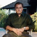 Leonardo DiCaprio in dark collared shirt