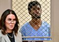 Lil Nas X, whose legal name is Montero Lamar Hill, is arraigned in court, next to his attorney Christy O'Connor, on four felony counts, including three counts of battery with injury on a police officer, Monday, Aug. 25, 2025, in Los Angeles. (Frederic J Brown/Pool Photo via AP)