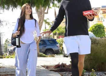 Madison Beer and rumored new boyfriend Justin Herbert were seen arriving at a friend's house in the Redondo Beach neighbor of Los Angeles on Sunday