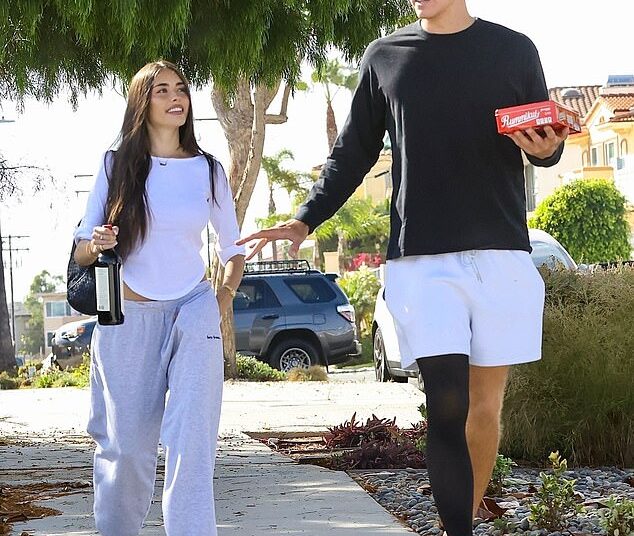 Madison Beer and rumored new boyfriend Justin Herbert were seen arriving at a friend's house in the Redondo Beach neighbor of Los Angeles on Sunday
