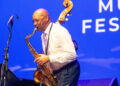 Branford Marsalis Quartet, featuring Branford Marsalis on saxophone, Eric Revis on bass, Justin Faulkner on drums, and Joey Calderazzo on piano, performed at the Savannah Music Festival on April 5th at the Lucas Theatre for the Arts in Savannah, GA.