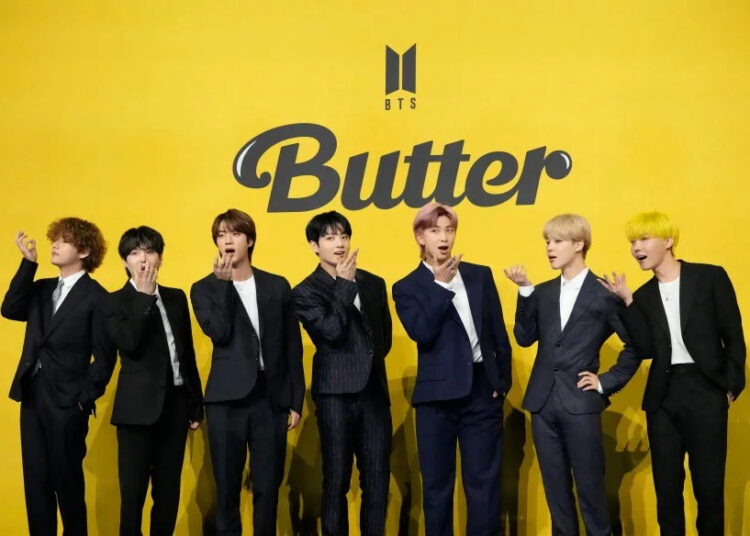 Members of South Korean K-pop band BTS, V, SUGA, JIN, Jung Kook, RM, Jimin, and j-hope from left to right, pose for photographers ahead of a press conference to introduce their new single “Butter” in Seoul, South Korea, May 21, 2021. (AP Photo/Lee Jin-man, File)