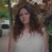 megan stalter as jessica walking down a brooklyn street in too much