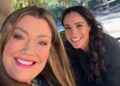 Meghan Markle smiling with her friend Jamie Kern Lima in a selfie taken outside
