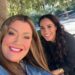 Meghan Markle smiling with her friend Jamie Kern Lima in a selfie taken outside