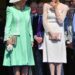 Queen Camilla with the Duchess of Sussex, in nude tights, at a garden party at Buckingham Palace shortly after her 2018 wedding