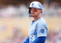 May 24, 2025; Minneapolis, Minnesota, USA; The third base umpire calls Kansas City Royals left fielder Michael Massey (19) out for swinging on a ball pitched by Minnesota Twins starting pitcher Zebby Matthews (52, not shown) in the second inning at Target Field. Mandatory Credit: Matt Blewett-Imagn Images