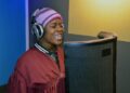 Belodie Musombu sings during a recording session at Jerusalem United Methodist Church’s new studio in South Congo. Musombu is a member of the church’s New Covenant United Methodist Choir, which raised nearly $50,000 to build the modern recording studio. It includes a soundproof booth, high-quality microphones and other equipment. Photo by Jenovic Mandandj, UM News.