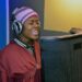 Belodie Musombu sings during a recording session at Jerusalem United Methodist Church’s new studio in South Congo. Musombu is a member of the church’s New Covenant United Methodist Choir, which raised nearly $50,000 to build the modern recording studio. It includes a soundproof booth, high-quality microphones and other equipment. Photo by Jenovic Mandandj, UM News.